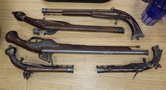 Five theatrical pistols